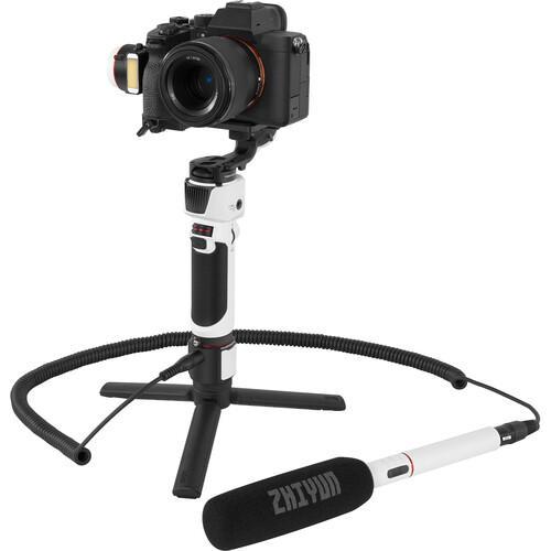 تصویر از گیمبال ژیون تک کرین ام 3 پرو Zhiyun-Tech CRANE-M3 Stabilizer Pro Kit به صورت ایستاده و دوربین سوار شده روی آن به همراه میکروفون
