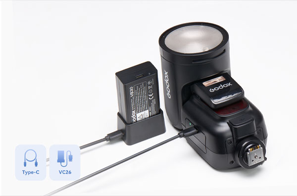 فلاش اسپیدلایت گودکس Godox و باتری در زمینه سفید